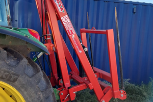 Caricatore posteriore per rotoballe