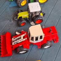 Giocattoli trattori e pale gommate