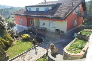 Villa bifamiliare con terrazzi, garage e terreno