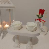 tavolino/espositore in gesso con candele 