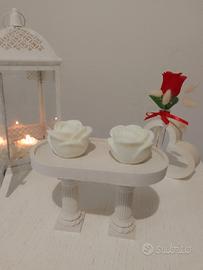 tavolino/espositore in gesso con candele 