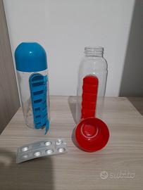 Bottiglia di Acqua con Il Quotidiano Scatola