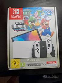 Nintendo Switch OLED e kit sports
