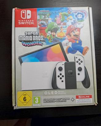 Nintendo Switch OLED e kit sports