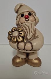 Simpatico gnomo Thun con fiore