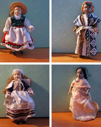 Quattro bambole da collezione in ceramica vintage