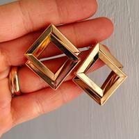 Orecchini geometrici con quadrati intrecciati 