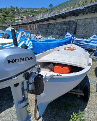 gozzo con motore fuoribordo