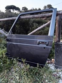 Portiera  2 gomme rimarchiate paraurti e radiatore