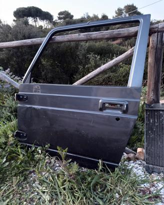 Portiera  2 gomme rimarchiate paraurti e radiatore