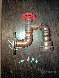 lampada da muro a forma di rubinetto 