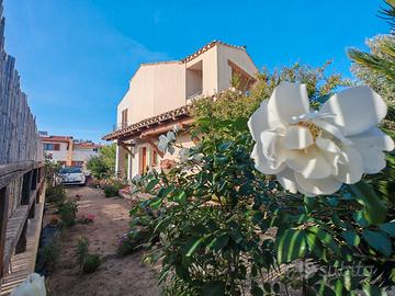 Bifamiliare con giardino su tre lati