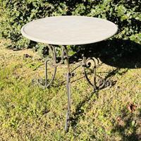 Tavolo in ferro con piano in pietra p.900