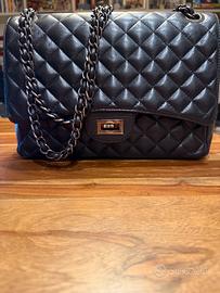 Borsa elegante trapuntata con tracolla a catena