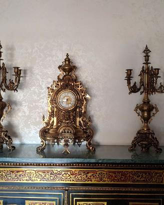 Trittico Orologio e due Candelabri in bronzo