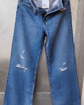 Jeans H&M,gamba ampia,vita alta,con strappi,nuovi.