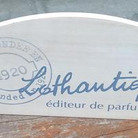 Lothantique profumo testata espositore in legno