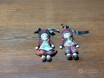 Coppia bamboline polvere ceramica artigianali