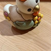 Gallina ester con fiore thun