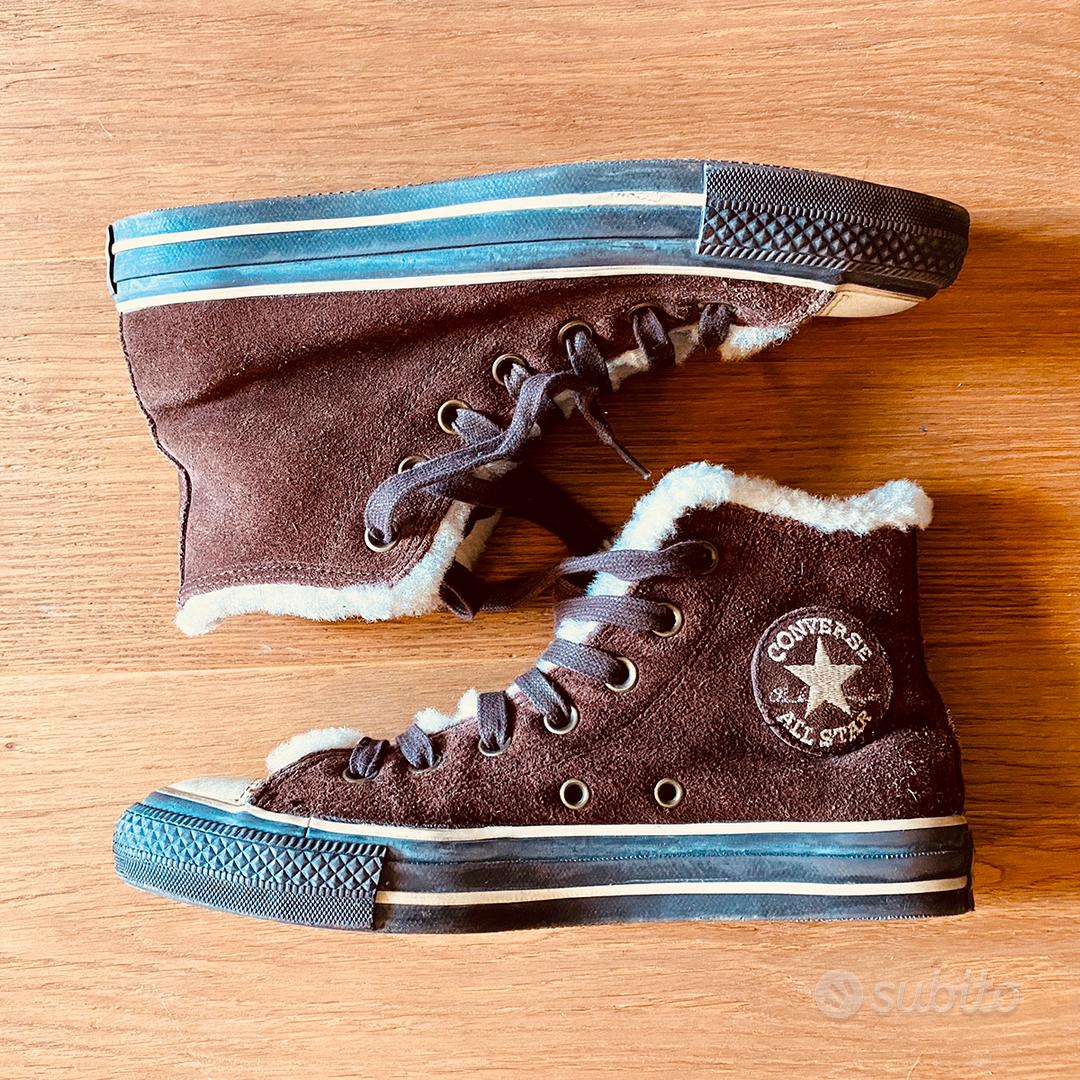 Converse di pelle con pelliccia sale