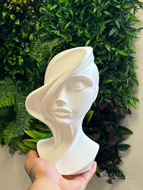 Statuetta volto donna semicoperto