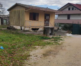 Casa prefabbricata e terreno