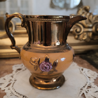 Lattiera in stile rococò