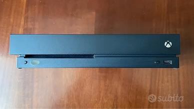 Xbox one X + Kit play and charge