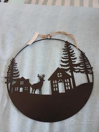 decorazione in metallo con renna