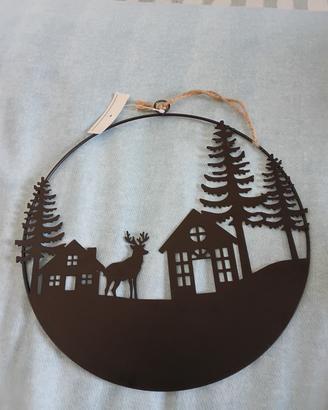 decorazione in metallo con renna