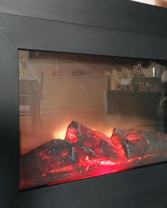 la fiamma calda accoglie in casa