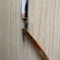 Rasoio a mano libera e coramella