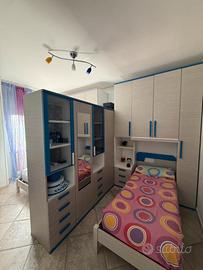 Cameretta doppia completa con armadio divisorio