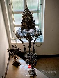 set orologio  funzionante , due candelabri,. 