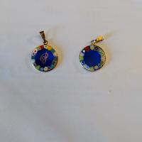 Due ciondoli Murrina in argento oro con l