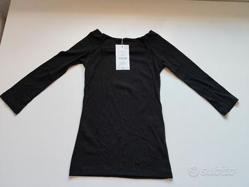 Blusa nuova con cartellino di Zara. Colore nera