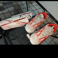 scarpe e parastinchi 