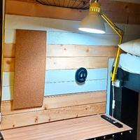 Camera con cucinotto e toilette