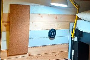 Camera con cucinotto e toilette