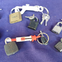 Set di 7 lucchetti vintage per borse valigie etc