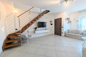 Appartamento con attico pulsano