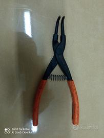 Pinza apri anelli