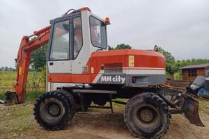 Escavatore gommato