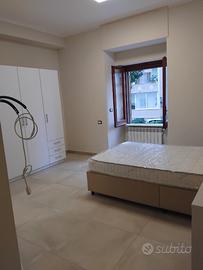 Camera arredata con bagno privato