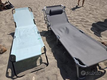 Lettini da spiaggia e ombrellone