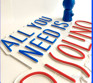 Insegna luminosa di "Insulti luminosi"