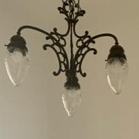 Lampadario antico in ferro battuto