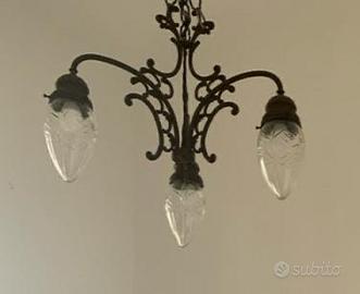 Lampadario antico in ferro battuto