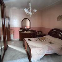 Camera da letto stile arte povera