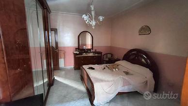 Camera da letto stile arte povera